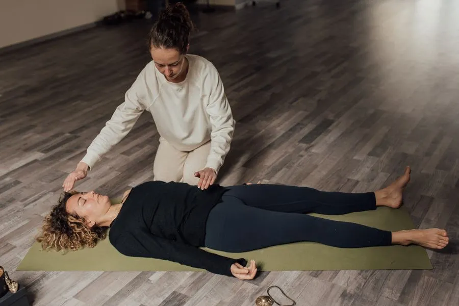 Energy healer working with a client's energy field